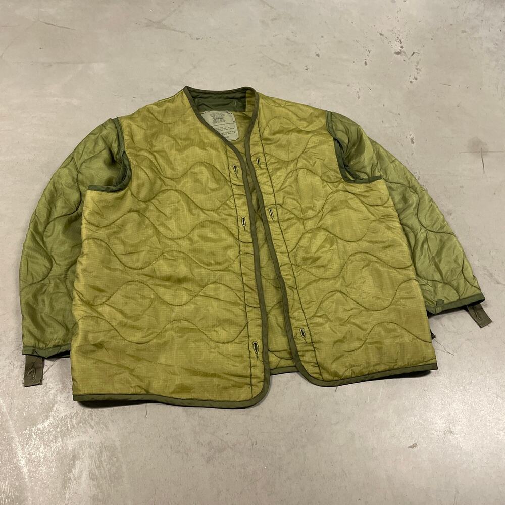 vintage men’s 90s green textured military liner quilted jacket